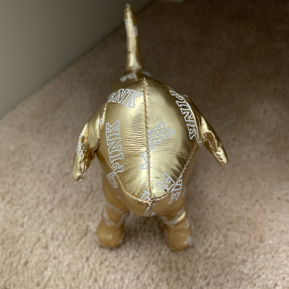 VS pink gold plush dog
